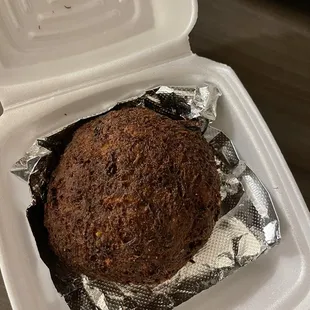 This was my crabcake that we ultimately got to go. I ended up throwing it out. It is completely burnt??