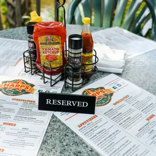 a table with menus and condiments