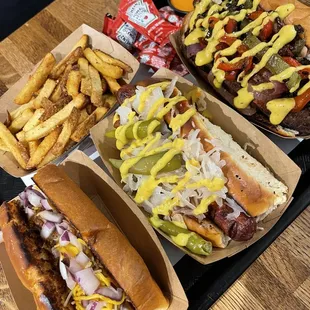 Chili dog, stadium dog, classic bratwurst and fries.