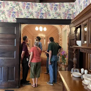 Visitors exploring the house's 1940s history as the Edgemont Inn--a Green Book site.
