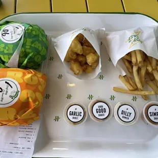 2 burgers, fries, cheese curds and sauce