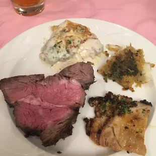 The meats:  clockwise champagne chicken, butter encrusted cod, rosemary roasted pork loin, and new york strip Filet