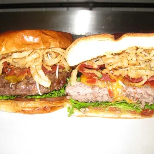 Ultimate Crown Burger - brioche, prosciutto, cheddar, heriloom tomato, arugula, chipotle aioli, onion straws