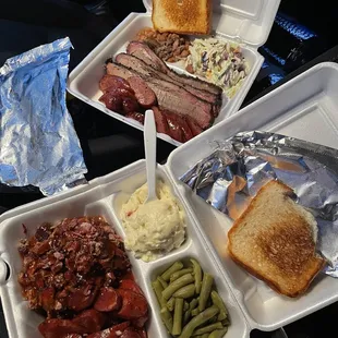 Chopped Brisket, sliced brisket, sausage, potato salad, beans, green beans, cole slaw and Texas toast