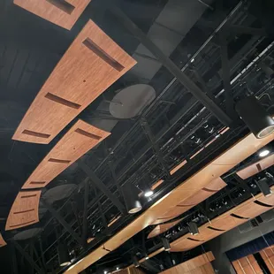 Acoustic hardwood additions on ceiling