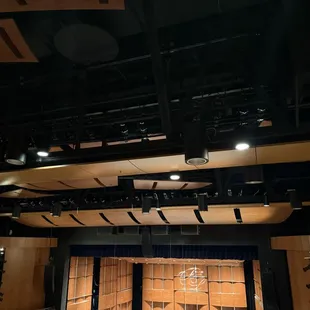Acoustic hardwood additions on ceiling