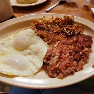 Corned beef hash and eggs, over easy eggs perfect