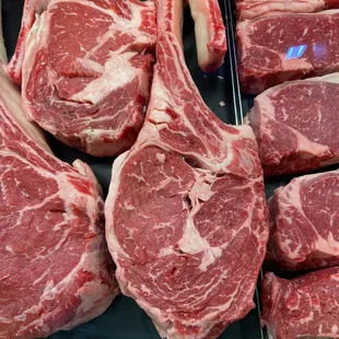 a variety of raw meat on display