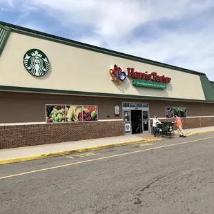 the front of a starbucks store
