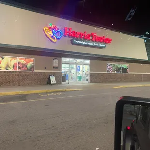 the front of a store at night