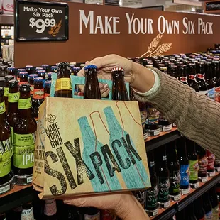 a man holding a sign in a store