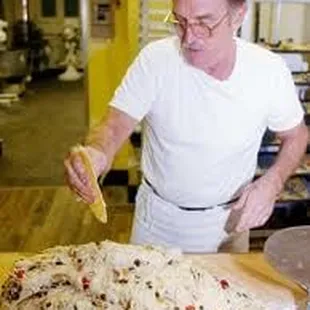 a man making a pizza