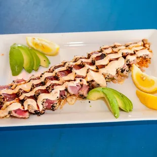 a plate of food on a blue table