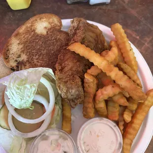 Fisherman sandwich with fries.