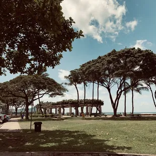 The parking lot and view that fronts the Ho&apos;okupu Center