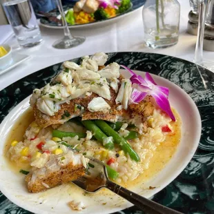 Crab topped Flounder corn risotto with green beans.