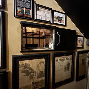 a wall of old newspapers