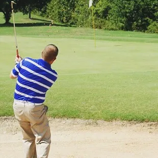 Sand shot from the 8th hole. Almost made it!