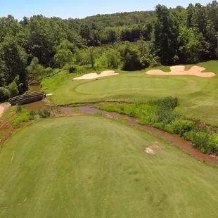 Hole #16 green, par 5 with a thin green over water...Can you say RISK/REWARD??
