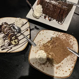 Cannoli, tiramisu, and chocolate cake