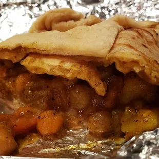 Potato &amp; chickpea roti ($16), vegan by default. Fabulous roti, soft and savory. Curry filling was just meh.