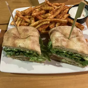 Sriracha Fried Chicken Sandwich and Staff Fries.