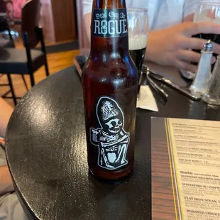 a bottle of beer on a table