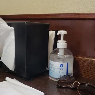 Sanitizer in every table.