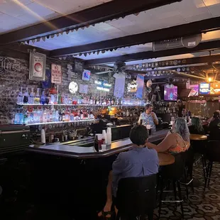 people sitting at the bar