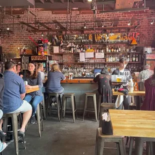 people sitting at the bar