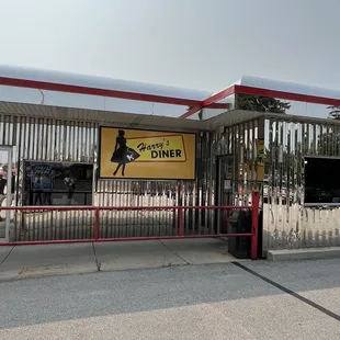 the entrance to harry&apos;s diner