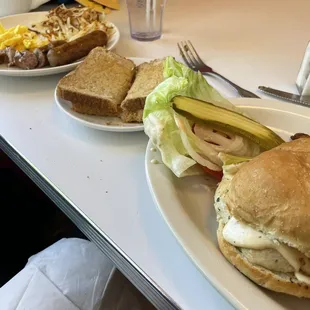 Chipotle chicken sandwich and kids egg and sausage.