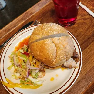 PulledPork on kaiser roll with cabbage slaw