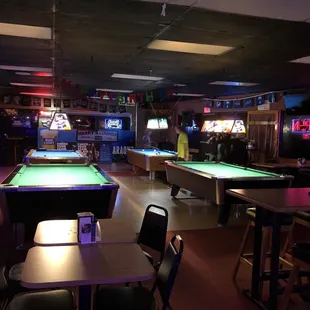 Four well maintained pool tables