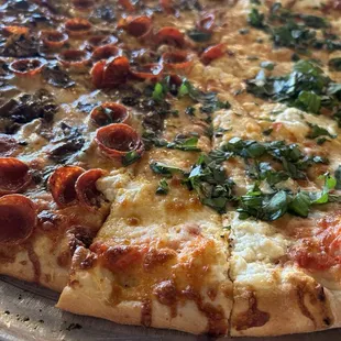 1/2 pepperoni mushroom, 1/2 garlic ricotta basil Extra cheese on the whole thing