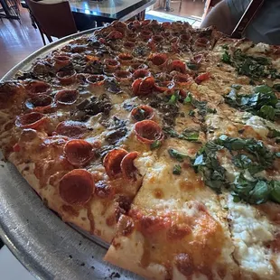 1/2 pepperoni mushroom, 1/2 garlic ricotta basil Extra cheese on the whole thing