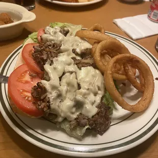 Prime rib in the foreground and shrimp dinner behind it.