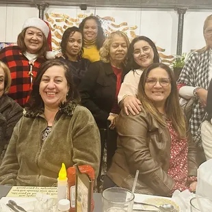 a group of women sitting at a table