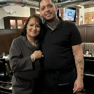 a man and woman posing for a picture