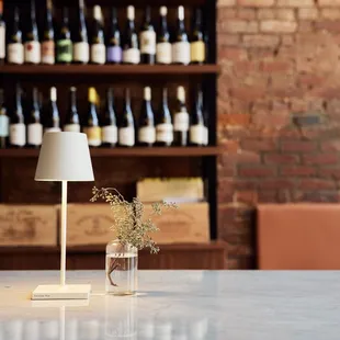 a table with a vase of flowers on it