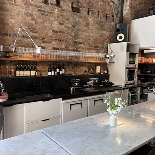 a man standing in a kitchen