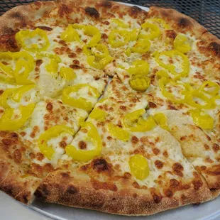 a pizza with peppers and cheese