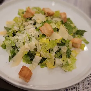 a plate of salad on a table