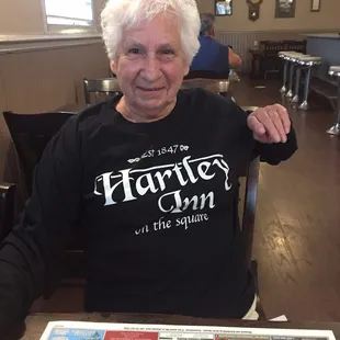 Mom sporting her new Hartley Inn garb.. not too different from when she waitressed at the Hartley Inn so many years ago.