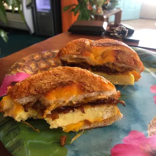 Cheddar bagel with cheddar, bacon, egg, and sriracha mayo