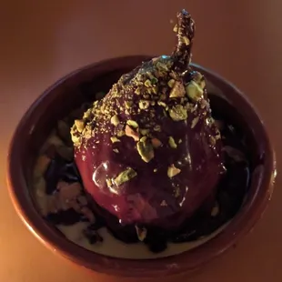 Pear dessert with creme anglaise pistachio chocolate