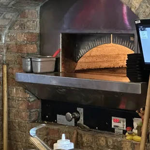 Wood-fired pizza oven.