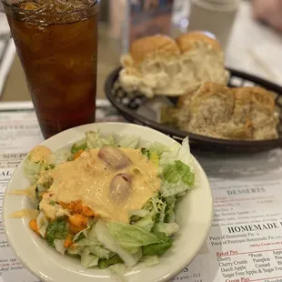 Salad and basket of fresh bread
