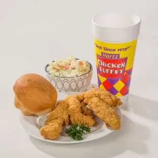 a plate of fried chicken and a cup of coleslaw