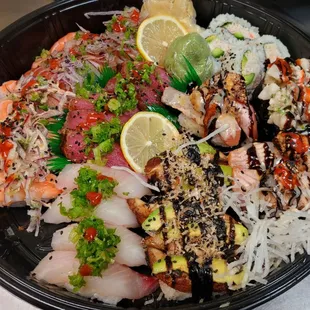 a close up of a bowl of sushi